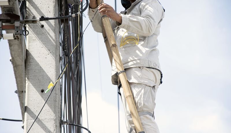 Technician working on cabling